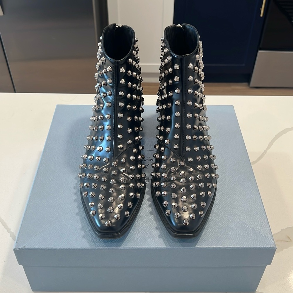 Prada women’s studded black leather boot